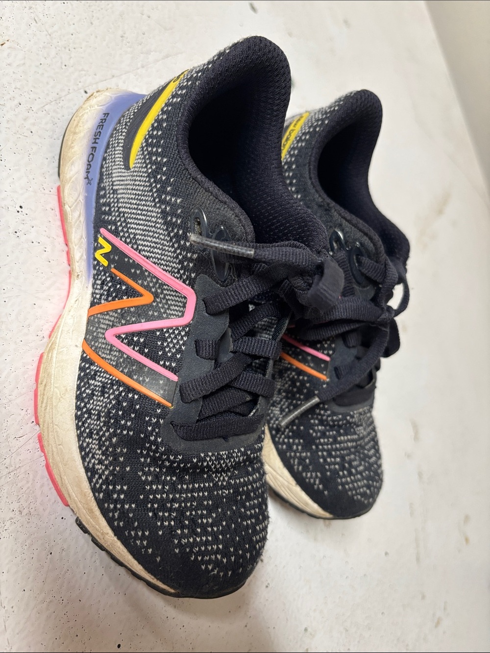 New Balance girls Black Knit Athletic Shoes with Pink, Orange & Yellow Accents